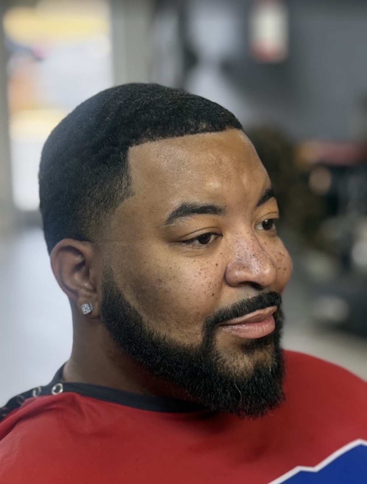 Full beard shape-up with a low fade and crisp hairline lineup in Fort Mill, SC.