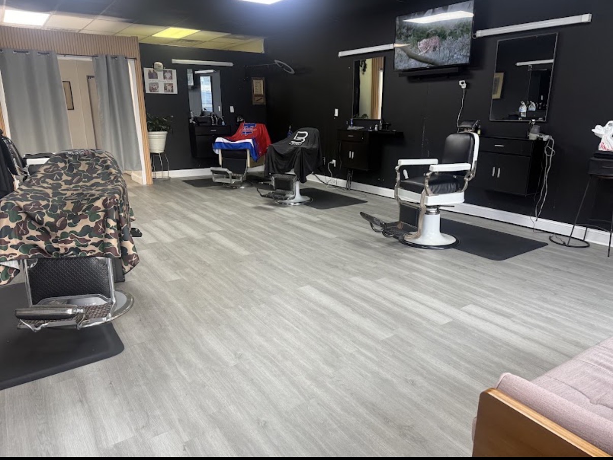 Inside Verified Cuts 2 barbershop in Fort Mill, SC with barber chairs and clean stations.
